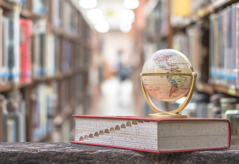 Globe sitting on book